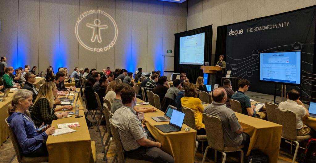 Me presenting on the Deque Systems stage at the CSUN Assistive Technology Conference